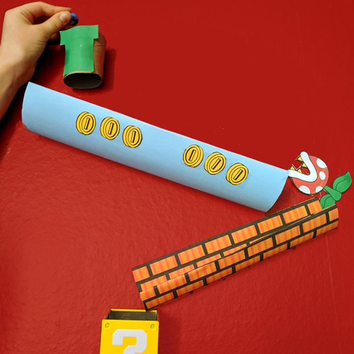 Wall marble run with a Mario game theme - STEM Calendar For Educators: Month By Month STEM Projects