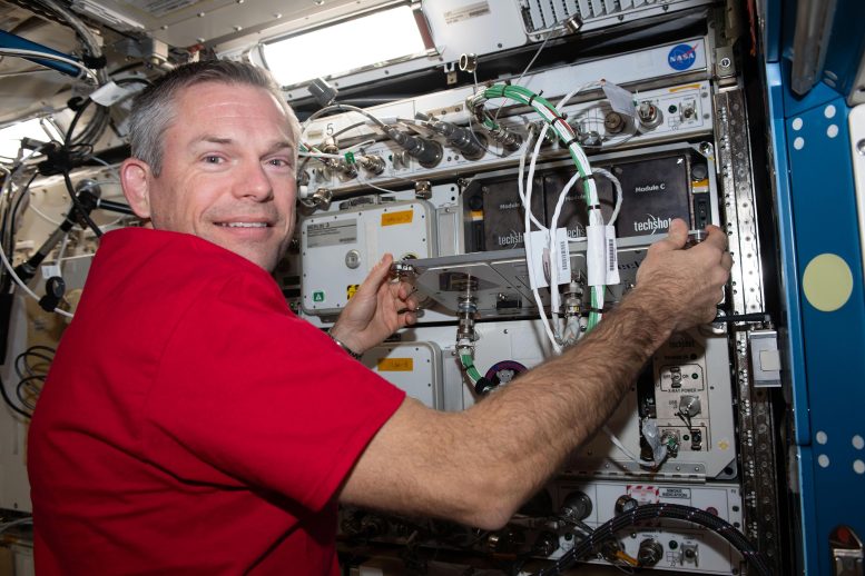 Astronaut Andreas Mogensen Replaces Computer Hardware in Research Gear - From Spacesuit Loop Scrubs To VR Therapy: Decoding A Day Of Science Aboard The ISS
