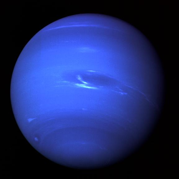 Neptune, as seen by Voyager 2 in 1989. The deep blue color applied helped enhance the view of features in the atmosphere. Image Credit: NASA/JPL - Uranus And Neptune Are Actually Pretty Much The Same Color