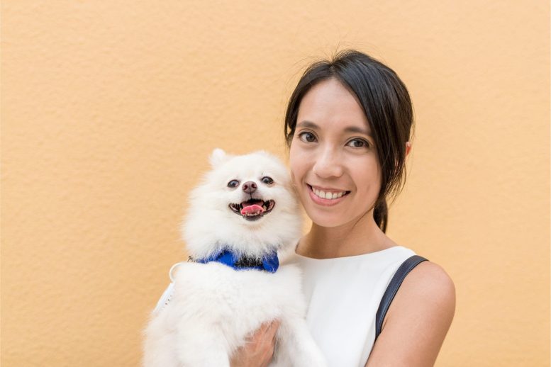 Woman and Dog - Do Pets Make You Happier? New Study Says Not Always