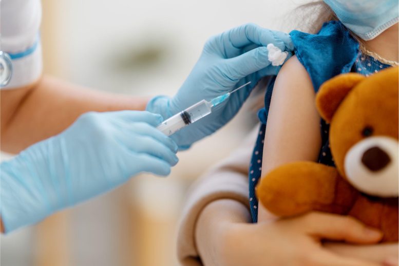 Young Child Holding Stuffed Animal Vaccine Shot - Shots Of Hope: COVID-19 Vaccine Reduces Long COVID In Children