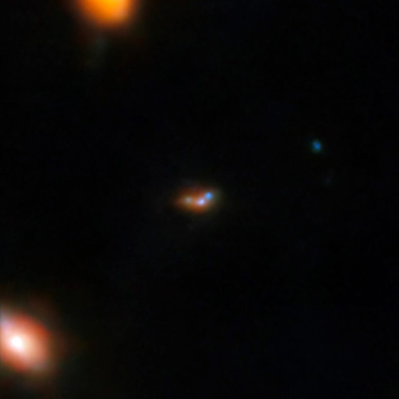 Close-In View of Three Neighboring Galaxies (Webb NIRCam Image) - Webb Telescope Unravels Cosmic Puzzle: Galaxy Mergers Illuminate Early Universe Mystery