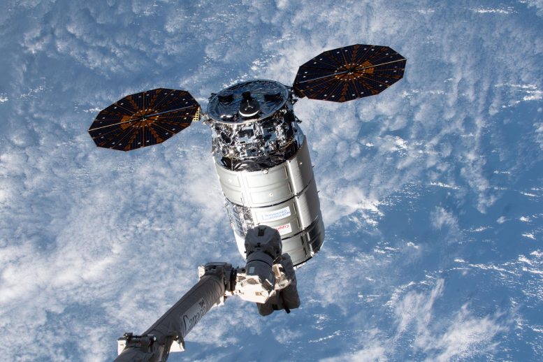 Canadarm2 Robotic Arm Reaches Out Toward Cygnus Space Freighter February 2024 - Cygnus Cargo Craft Arrives At Space Station As Private Astronauts Prepare For Return To Earth