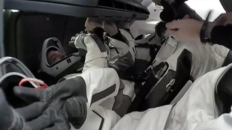 Axiom Mission 3 Crew Members Seated Inside the SpaceX Dragon Spacecraft Preparing for Undocking - Ax-3 Astronauts Undock From Space Station In SpaceX Dragon For Earth Return