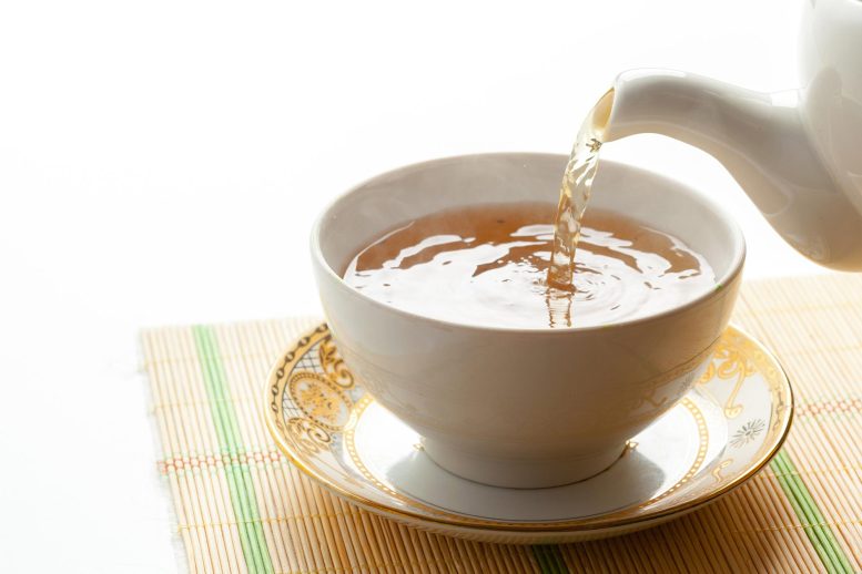 Pouring Tea Into Cup - Can A Cup Of Tea Keep COVID Away? Study Finds 99.9% Virus Reduction