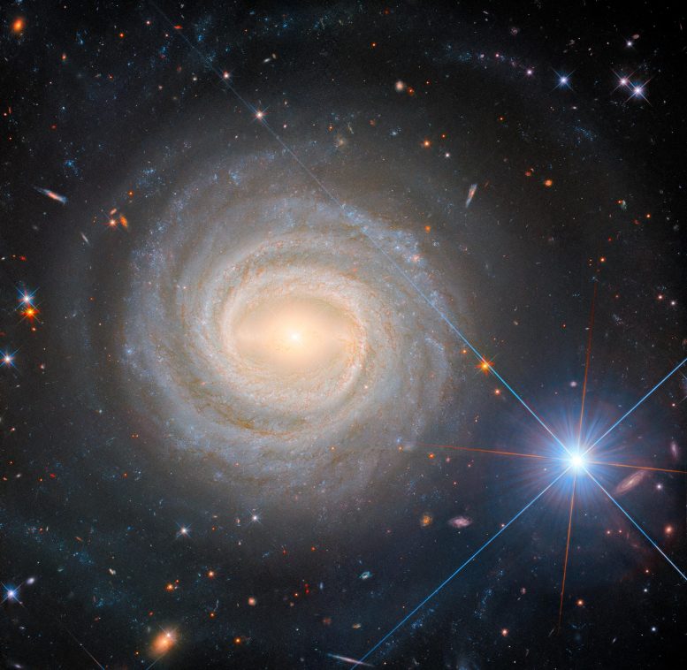 Spiral Galaxy NGC 3783 - How A Single Star Outshines A Massive Galaxy In The Cosmic Dance Of Light