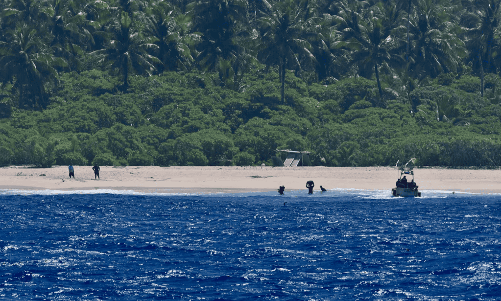 Sailors Rescued From Remote Island After Writing Big “HELP” On The Beach
