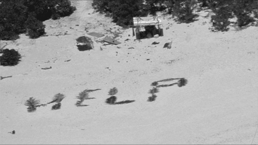 Sailors Rescued From Remote Island After Writing Big “HELP” On The Beach