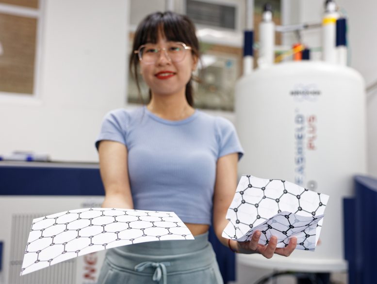 Xinyu Liu With Models of Graphene and a Disordered Carbon Electrode - Scientists Uncover Surprising Efficiency Of “Messy” Supercapacitors
