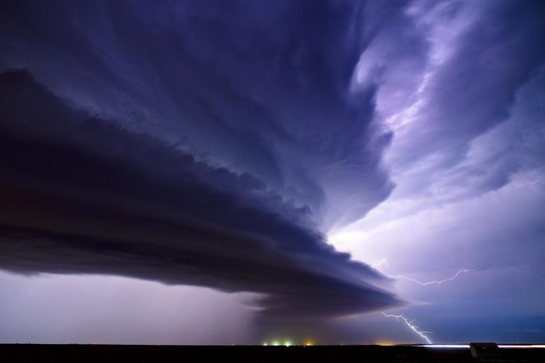 Hydraulic Jump Drives Stratospheric Hydration Above Intense Supercell Thunderstorms
