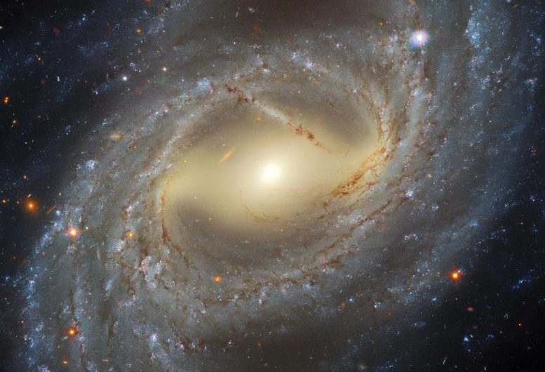 Four Filter Fusion: Hubble Captures a Stunning Stellar Whirlpool