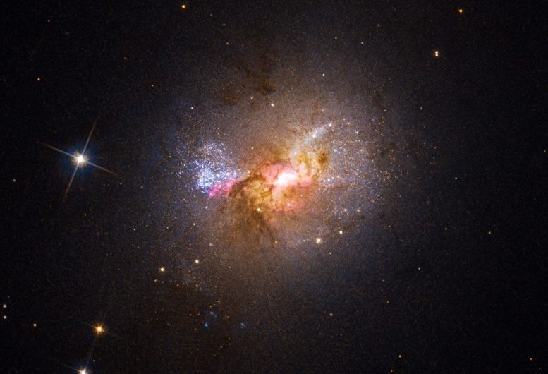 Hubble Spots a Black Hole Igniting a Firestorm of Star Formation in a Dwarf Galaxy